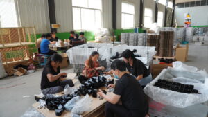 Weizhi team checking and packing custom metal parts