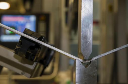 Press Brake Springback: Why Bends Overshoot and How Factories Compensate