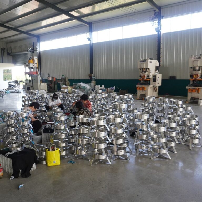 Stainless steel fabrication case: gas stove base assemblies on the production floor